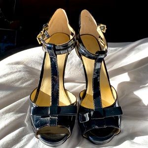 8.5 Black Nine West patent leather platform t-strap 4” heel. Wore once.